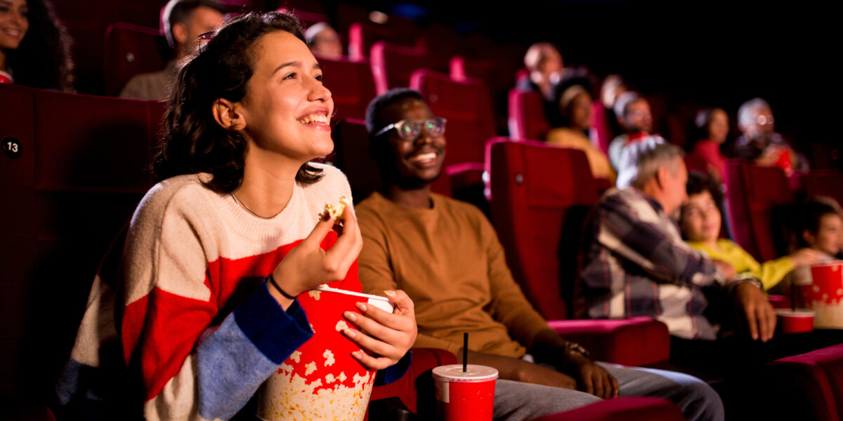 Friends enjoying a movie at the cinema